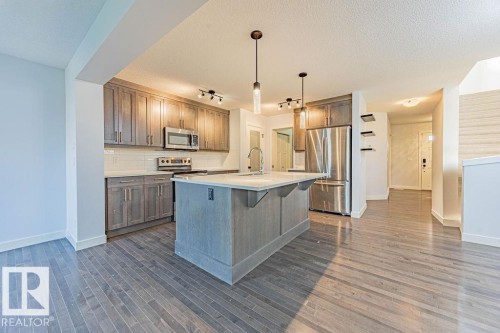 114 Radcliffe Wynd, Fort Saskatchewan, AB - Indoor Photo Showing Kitchen With Stainless Steel Kitchen With Upgraded Kitchen