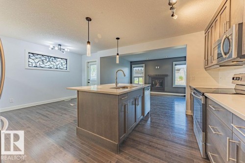 114 Radcliffe Wynd, Fort Saskatchewan, AB - Indoor Photo Showing Kitchen With Double Sink