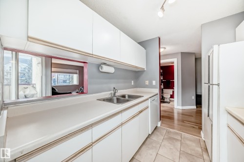 239 10636 120 Street, Edmonton, AB - Indoor Photo Showing Kitchen With Double Sink