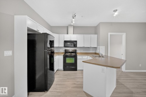 225 226 Macewan Road, Edmonton, AB - Indoor Photo Showing Kitchen With Double Sink