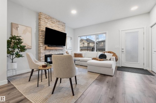 18955 29 Avenue, Edmonton, AB - Indoor Photo Showing Living Room With Fireplace