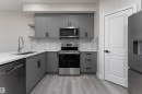 137 Pierwyck Loop, Spruce Grove, AB  - Indoor Photo Showing Kitchen With Double Sink 