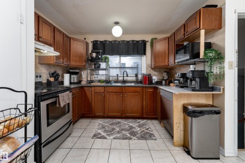 8207 169 Street, Edmonton, AB - Indoor Photo Showing Kitchen With Double Sink