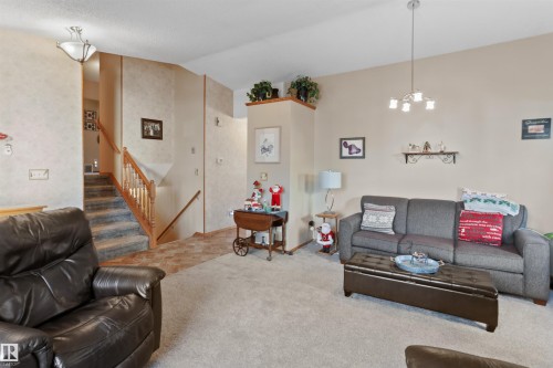 26 Elbow Drive, Devon, AB - Indoor Photo Showing Living Room