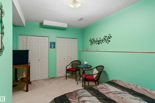 26 Elbow Drive, Devon, AB - Indoor Photo Showing Bedroom