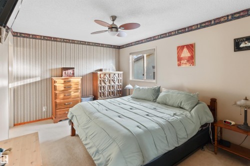 26 Elbow Drive, Devon, AB - Indoor Photo Showing Bedroom