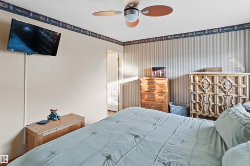 26 Elbow Drive, Devon, AB - Indoor Photo Showing Bedroom