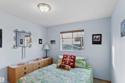 26 Elbow Drive, Devon, AB - Indoor Photo Showing Bedroom