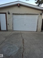 Garage with concrete driveway - 