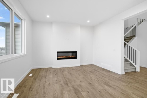 4847 Cawsey Terrace, Edmonton, AB - Indoor With Fireplace