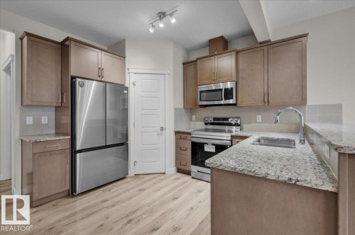 1515 21 Street, Edmonton, AB - Indoor Photo Showing Kitchen With Double Sink