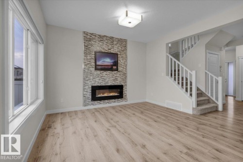 1515 21 Street, Edmonton, AB - Indoor Photo Showing Living Room With Fireplace
