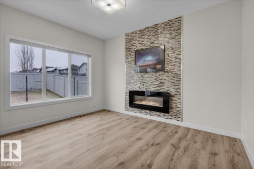 1515 21 Street, Edmonton, AB - Indoor Photo Showing Living Room With Fireplace