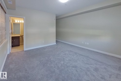 108 9603 98 Avenue, Edmonton, AB - Indoor Photo Showing Other Room