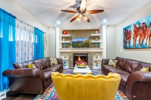 3235 16 Avenue, Edmonton, AB - Indoor Photo Showing Living Room With Fireplace