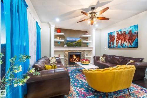 3235 16 Avenue, Edmonton, AB - Indoor Photo Showing Living Room With Fireplace