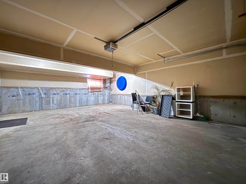 124 1670 Jamha Road, Edmonton, AB - Indoor Photo Showing Garage