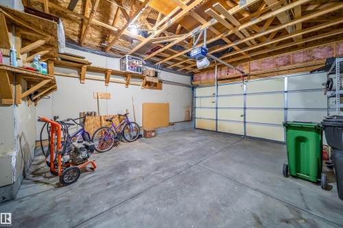 Garage with a heating unit and a garage door opener - 3504 20 Street, Edmonton, AB - Indoor Photo Showing Garage