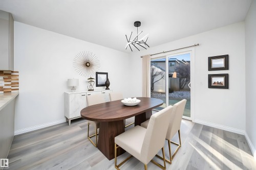Dining area featuring light wood-style floors and baseboards - 3504 20 Street, Edmonton, AB - Indoor Photo Showing Dining Room