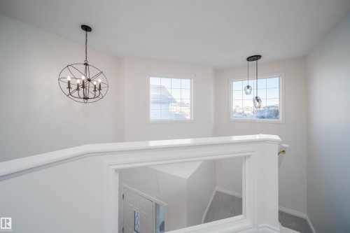 Detailed view of a chandelier - 3504 20 Street, Edmonton, AB - Indoor Photo Showing Other Room