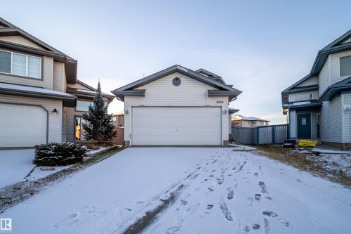 View of front of home featuring a garage and an outbuilding - 3504 20 Street, Edmonton, AB - Outdoor
