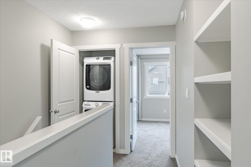 14 1110 Daniels Link Link, Edmonton, AB - Indoor Photo Showing Laundry Room