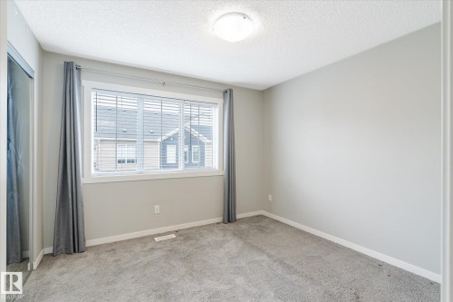 14 1110 Daniels Link Link, Edmonton, AB - Indoor Photo Showing Other Room