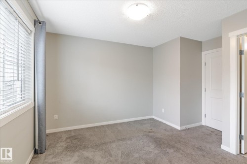14 1110 Daniels Link Link, Edmonton, AB - Indoor Photo Showing Other Room