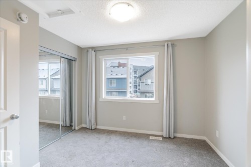 14 1110 Daniels Link Link, Edmonton, AB - Indoor Photo Showing Other Room