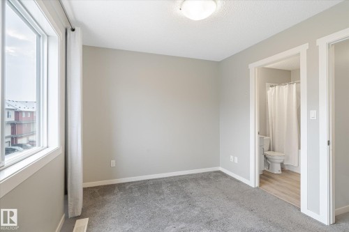 14 1110 Daniels Link Link, Edmonton, AB - Indoor Photo Showing Other Room