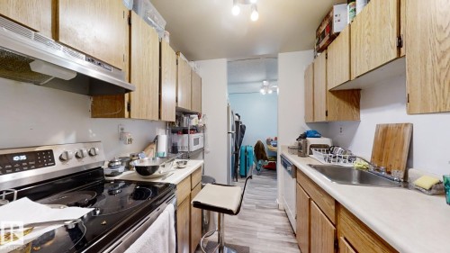 407 2624 Mill Woods Road E, Edmonton, AB - Indoor Photo Showing Kitchen