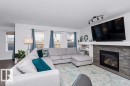 8220 Shaske Place, Edmonton, AB  - Indoor Photo Showing Living Room With Fireplace 