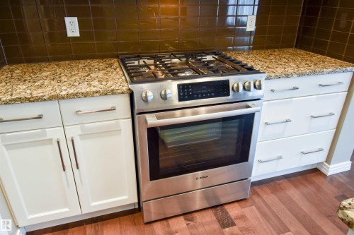 19 Meadowgrove Lane, Spruce Grove, AB - Indoor Photo Showing Kitchen With Upgraded Kitchen