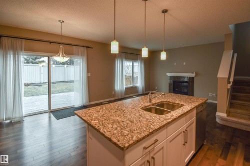 19 Meadowgrove Lane, Spruce Grove, AB - Indoor Photo Showing Kitchen With Double Sink
