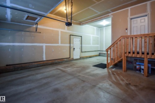 19 Meadowgrove Lane, Spruce Grove, AB - Indoor Photo Showing Garage