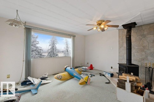 26110 Twp Road 554, Rural Sturgeon County, AB - Indoor Photo Showing Gym Room