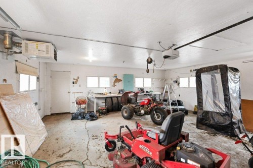 26110 Twp Road 554, Rural Sturgeon County, AB - Indoor Photo Showing Garage