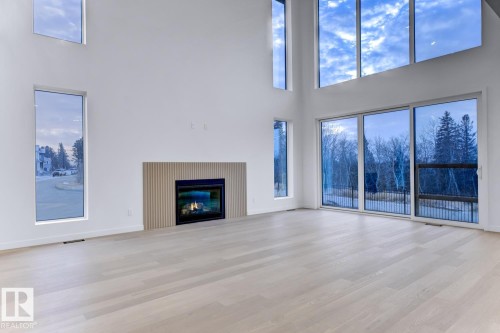 7 6090 Crawford Drive, Edmonton, AB - Indoor Photo Showing Living Room With Fireplace