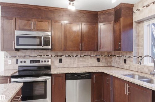 11026 108 Avenue, Edmonton, AB - Indoor Photo Showing Kitchen With Stainless Steel Kitchen With Double Sink