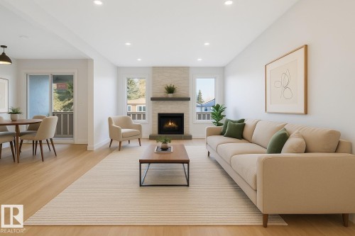 6030 Mill Woods Rd S, Edmonton, AB - Indoor Photo Showing Living Room With Fireplace