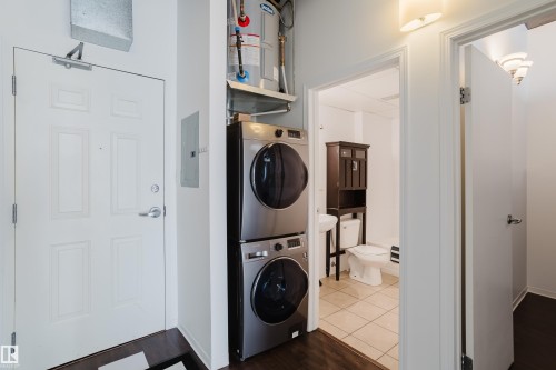 1611 10024 Jasper Avenue, Edmonton, AB - Indoor Photo Showing Laundry Room