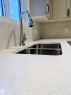 90 Dansereau Way, Beaumont, AB  - Indoor Photo Showing Kitchen With Double Sink 