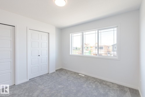 90 Dansereau Way, Beaumont, AB - Indoor Photo Showing Other Room