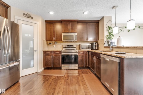 2919 16 Avenue, Edmonton, AB - Indoor Photo Showing Kitchen With Stainless Steel Kitchen