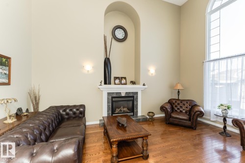 12927 Hudson Way, Edmonton, AB - Indoor Photo Showing Living Room With Fireplace