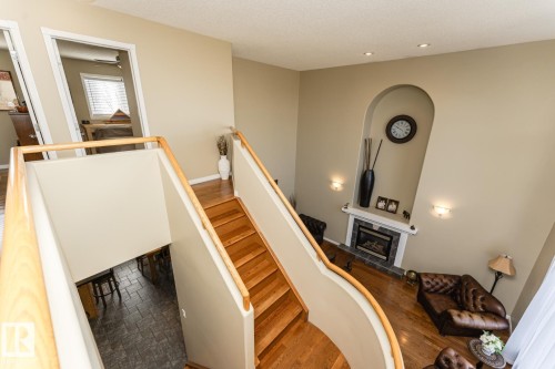 12927 Hudson Way, Edmonton, AB - Indoor Photo Showing Other Room With Fireplace