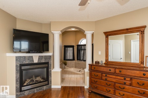12927 Hudson Way, Edmonton, AB - Indoor Photo Showing Living Room With Fireplace