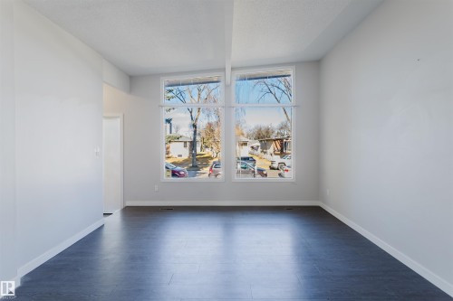 8123 8125 83 Avenue, Edmonton, AB - Indoor Photo Showing Other Room