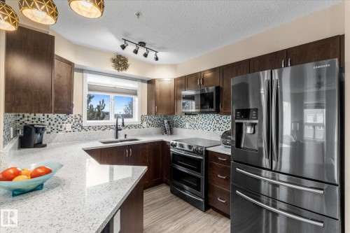 303 396 Silver Berry Road, Edmonton, AB - Indoor Photo Showing Kitchen With Upgraded Kitchen
