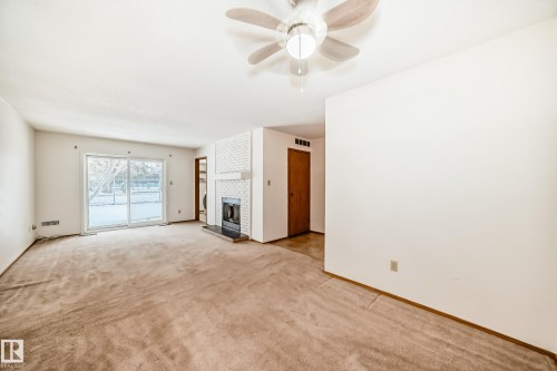 104 70 Alpine Place, St. Albert, AB - Indoor With Fireplace